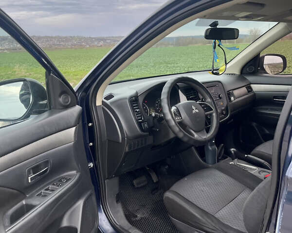 Синій Міцубісі Аутлендер, об'ємом двигуна 2.4 л та пробігом 262 тис. км за 8500 $, фото 11 на Automoto.ua