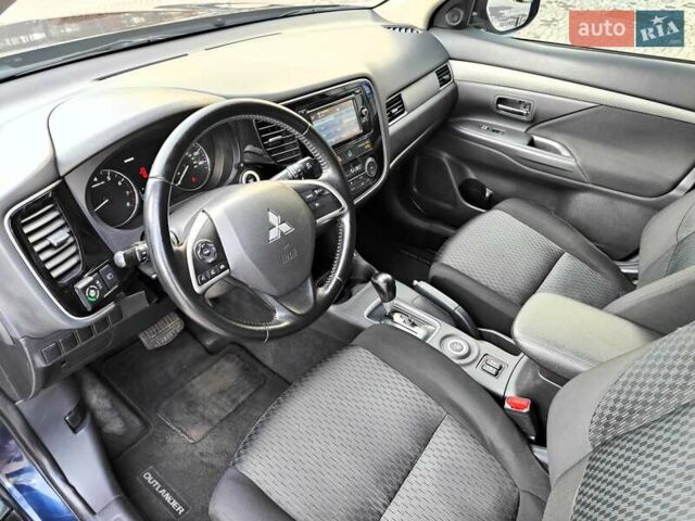 Синій Міцубісі Аутлендер, об'ємом двигуна 2.4 л та пробігом 213 тис. км за 10990 $, фото 35 на Automoto.ua