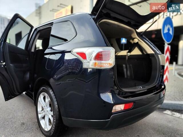 Синій Міцубісі Аутлендер, об'ємом двигуна 2.4 л та пробігом 213 тис. км за 10990 $, фото 13 на Automoto.ua