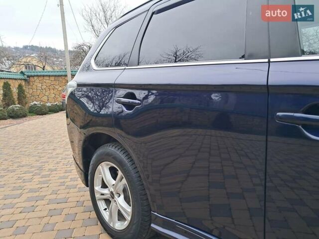 Синий Мицубиси Аутлендер, объемом двигателя 2.2 л и пробегом 274 тыс. км за 12900 $, фото 42 на Automoto.ua