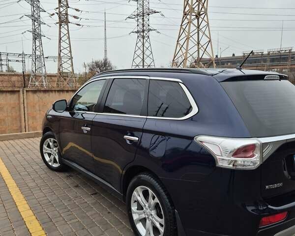 Синій Міцубісі Аутлендер, об'ємом двигуна 2.36 л та пробігом 183 тис. км за 14000 $, фото 2 на Automoto.ua