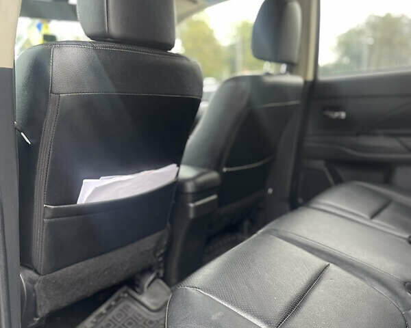 Синій Міцубісі Аутлендер, об'ємом двигуна 2 л та пробігом 155 тис. км за 14999 $, фото 16 на Automoto.ua