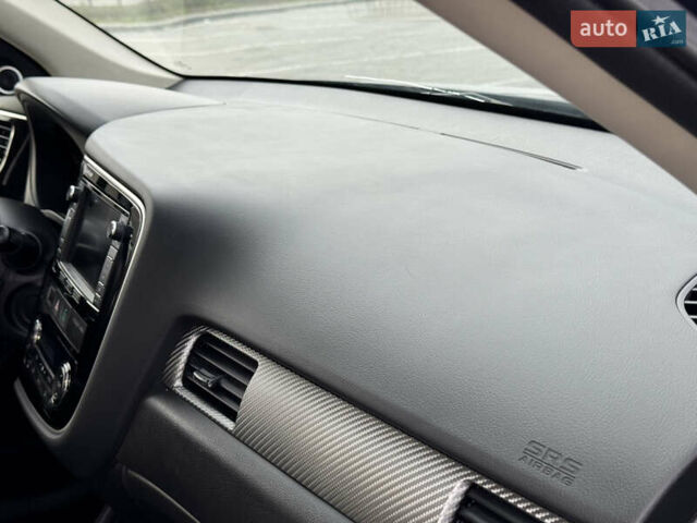 Синий Мицубиси Аутлендер, объемом двигателя 2 л и пробегом 218 тыс. км за 12550 $, фото 36 на Automoto.ua