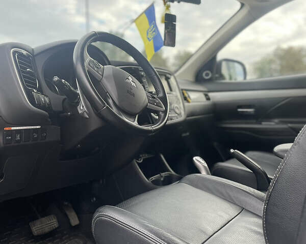 Синій Міцубісі Аутлендер, об'ємом двигуна 2 л та пробігом 155 тис. км за 14999 $, фото 18 на Automoto.ua