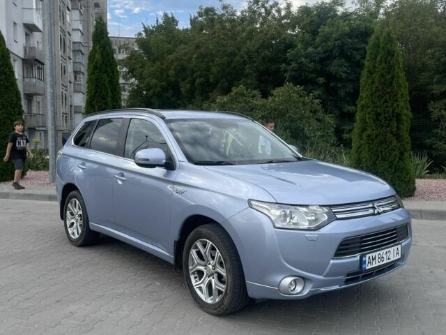 Синий Мицубиси Аутлендер, объемом двигателя 2 л и пробегом 153 тыс. км за 15499 $, фото 2 на Automoto.ua