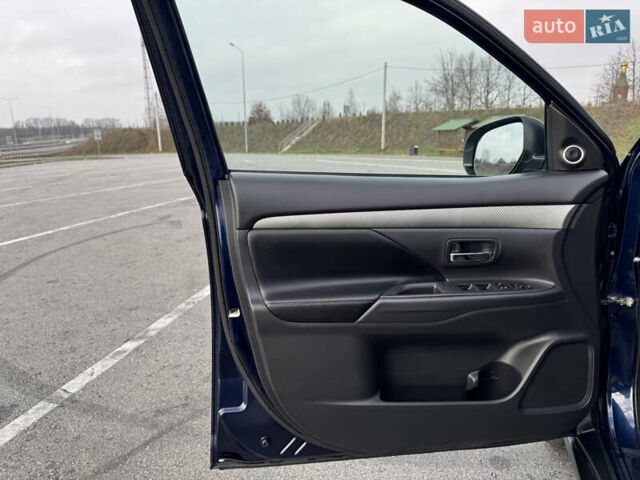 Синий Мицубиси Аутлендер, объемом двигателя 2 л и пробегом 218 тыс. км за 12550 $, фото 29 на Automoto.ua