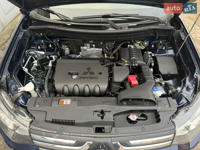 Синий Мицубиси Аутлендер, объемом двигателя 2 л и пробегом 218 тыс. км за 12550 $, фото 47 на Automoto.ua