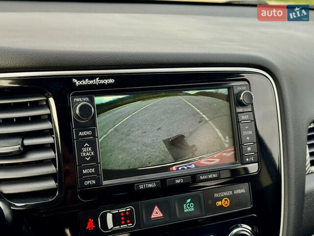 Синий Мицубиси Аутлендер, объемом двигателя 2 л и пробегом 218 тыс. км за 12550 $, фото 23 на Automoto.ua