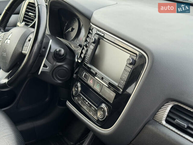 Синий Мицубиси Аутлендер, объемом двигателя 2 л и пробегом 218 тыс. км за 12550 $, фото 37 на Automoto.ua