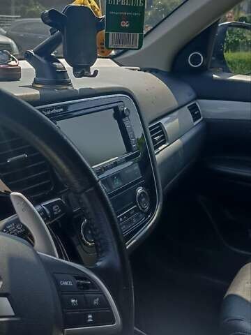 Синій Міцубісі Аутлендер, об'ємом двигуна 2 л та пробігом 146 тис. км за 14000 $, фото 20 на Automoto.ua