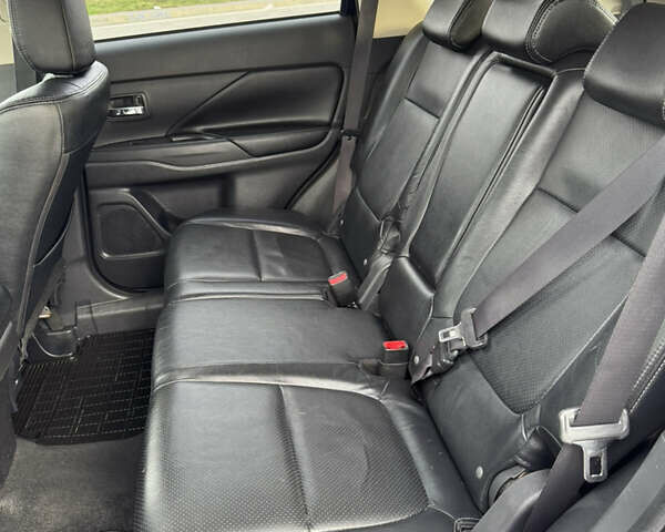 Синий Мицубиси Аутлендер, объемом двигателя 2 л и пробегом 218 тыс. км за 12550 $, фото 32 на Automoto.ua