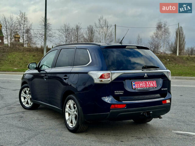 Синий Мицубиси Аутлендер, объемом двигателя 2 л и пробегом 218 тыс. км за 12550 $, фото 2 на Automoto.ua