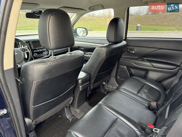 Синий Мицубиси Аутлендер, объемом двигателя 2 л и пробегом 218 тыс. км за 12550 $, фото 31 на Automoto.ua