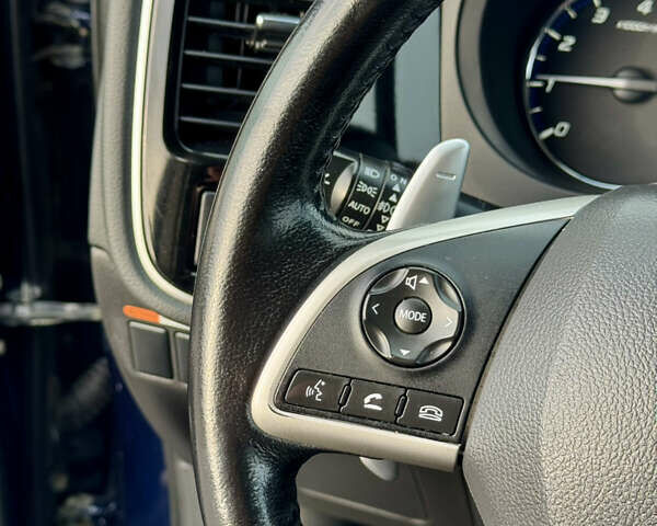 Синий Мицубиси Аутлендер, объемом двигателя 2 л и пробегом 218 тыс. км за 12550 $, фото 19 на Automoto.ua