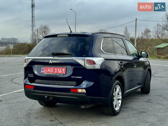 Синий Мицубиси Аутлендер, объемом двигателя 2 л и пробегом 218 тыс. км за 12550 $, фото 4 на Automoto.ua