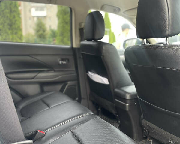 Синій Міцубісі Аутлендер, об'ємом двигуна 2 л та пробігом 155 тис. км за 14999 $, фото 13 на Automoto.ua