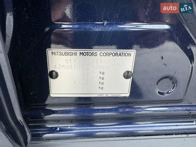 Синий Мицубиси Аутлендер, объемом двигателя 2 л и пробегом 218 тыс. км за 12550 $, фото 46 на Automoto.ua