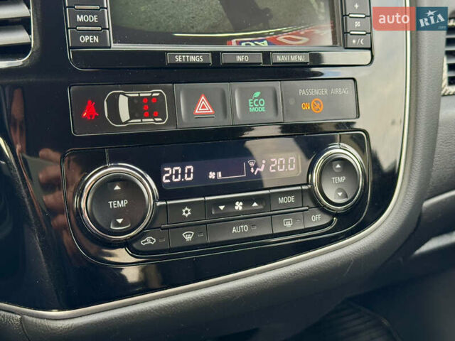 Синий Мицубиси Аутлендер, объемом двигателя 2 л и пробегом 218 тыс. км за 12550 $, фото 24 на Automoto.ua