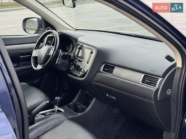 Синий Мицубиси Аутлендер, объемом двигателя 2 л и пробегом 218 тыс. км за 12550 $, фото 34 на Automoto.ua