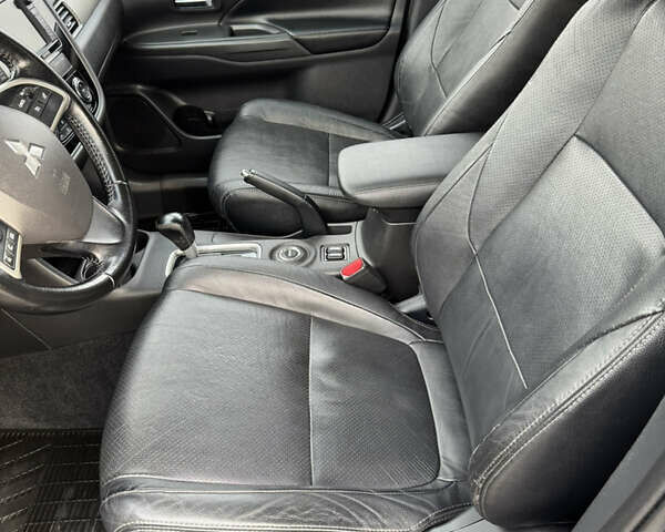 Синий Мицубиси Аутлендер, объемом двигателя 2 л и пробегом 218 тыс. км за 12550 $, фото 17 на Automoto.ua