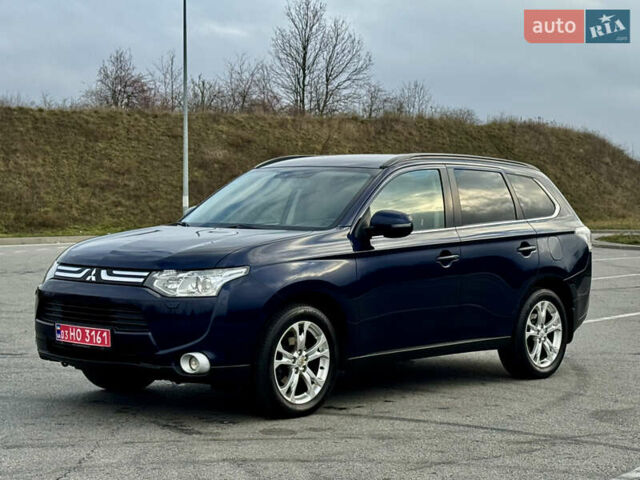 Синий Мицубиси Аутлендер, объемом двигателя 2 л и пробегом 218 тыс. км за 12550 $, фото 52 на Automoto.ua