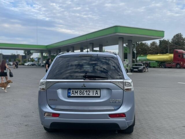 Синий Мицубиси Аутлендер, объемом двигателя 2 л и пробегом 153 тыс. км за 15499 $, фото 4 на Automoto.ua