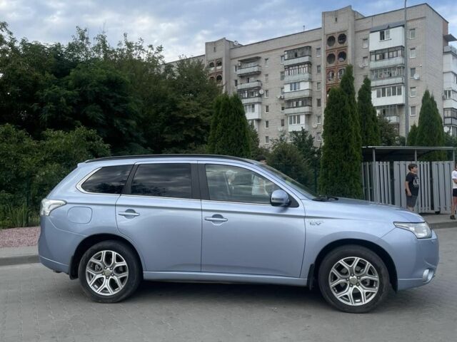 Синий Мицубиси Аутлендер, объемом двигателя 2 л и пробегом 153 тыс. км за 15499 $, фото 1 на Automoto.ua