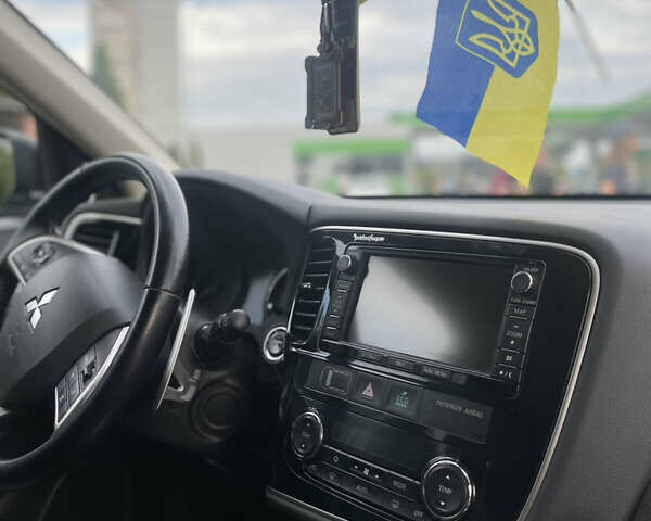 Синій Міцубісі Аутлендер, об'ємом двигуна 2 л та пробігом 155 тис. км за 14999 $, фото 11 на Automoto.ua