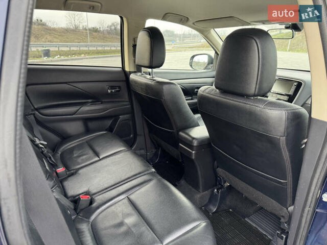 Синий Мицубиси Аутлендер, объемом двигателя 2 л и пробегом 218 тыс. км за 12550 $, фото 39 на Automoto.ua