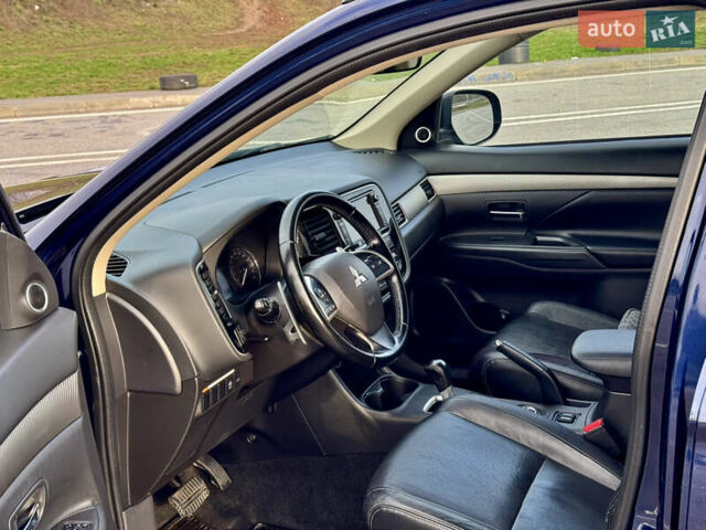 Синий Мицубиси Аутлендер, объемом двигателя 2 л и пробегом 218 тыс. км за 12550 $, фото 14 на Automoto.ua