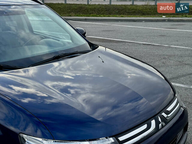 Синий Мицубиси Аутлендер, объемом двигателя 2 л и пробегом 218 тыс. км за 12550 $, фото 9 на Automoto.ua