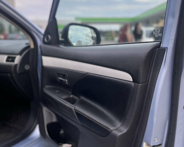 Синій Міцубісі Аутлендер, об'ємом двигуна 2 л та пробігом 155 тис. км за 14999 $, фото 10 на Automoto.ua