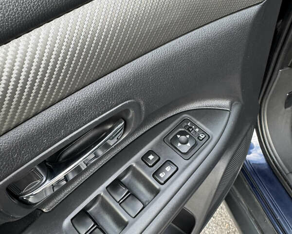 Синий Мицубиси Аутлендер, объемом двигателя 2 л и пробегом 218 тыс. км за 12550 $, фото 30 на Automoto.ua