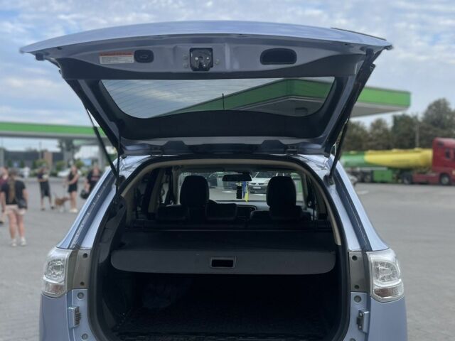 Синий Мицубиси Аутлендер, объемом двигателя 2 л и пробегом 153 тыс. км за 15499 $, фото 3 на Automoto.ua