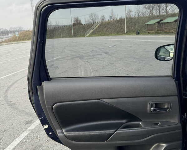 Синий Мицубиси Аутлендер, объемом двигателя 2 л и пробегом 218 тыс. км за 12550 $, фото 33 на Automoto.ua