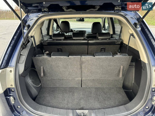 Синий Мицубиси Аутлендер, объемом двигателя 2 л и пробегом 218 тыс. км за 12550 $, фото 43 на Automoto.ua