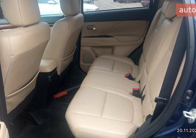 Синий Мицубиси Аутлендер, объемом двигателя 2.4 л и пробегом 230 тыс. км за 11300 $, фото 10 на Automoto.ua