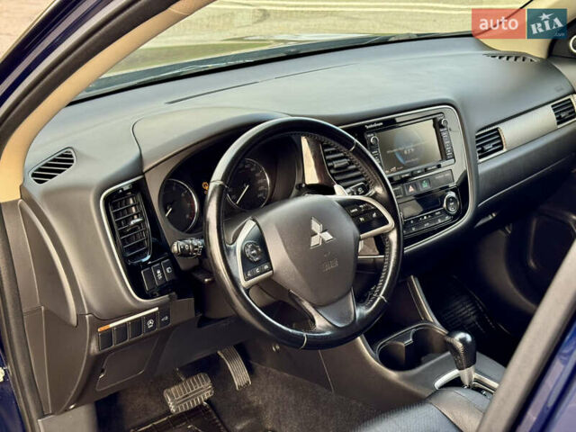 Синий Мицубиси Аутлендер, объемом двигателя 2 л и пробегом 218 тыс. км за 12550 $, фото 13 на Automoto.ua