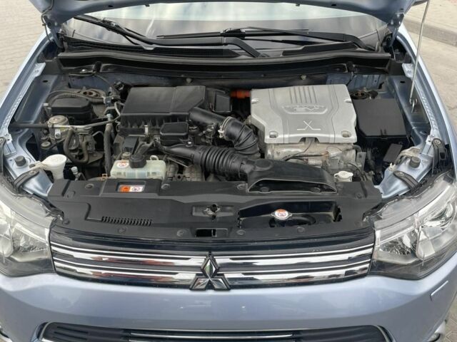 Синий Мицубиси Аутлендер, объемом двигателя 2 л и пробегом 153 тыс. км за 15499 $, фото 5 на Automoto.ua