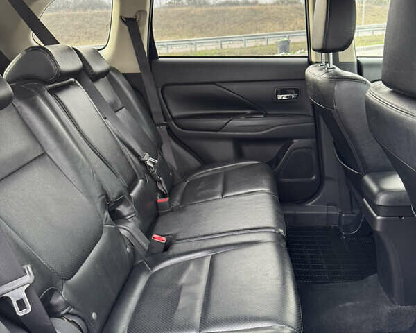 Синий Мицубиси Аутлендер, объемом двигателя 2 л и пробегом 218 тыс. км за 12550 $, фото 40 на Automoto.ua