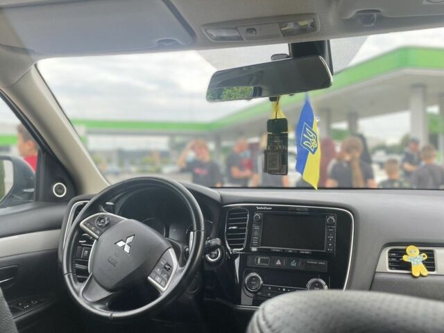 Синий Мицубиси Аутлендер, объемом двигателя 2 л и пробегом 153 тыс. км за 15499 $, фото 7 на Automoto.ua