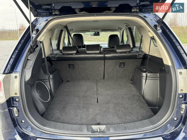 Синий Мицубиси Аутлендер, объемом двигателя 2 л и пробегом 218 тыс. км за 12550 $, фото 41 на Automoto.ua