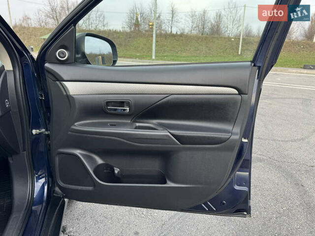 Синий Мицубиси Аутлендер, объемом двигателя 2 л и пробегом 218 тыс. км за 12550 $, фото 38 на Automoto.ua