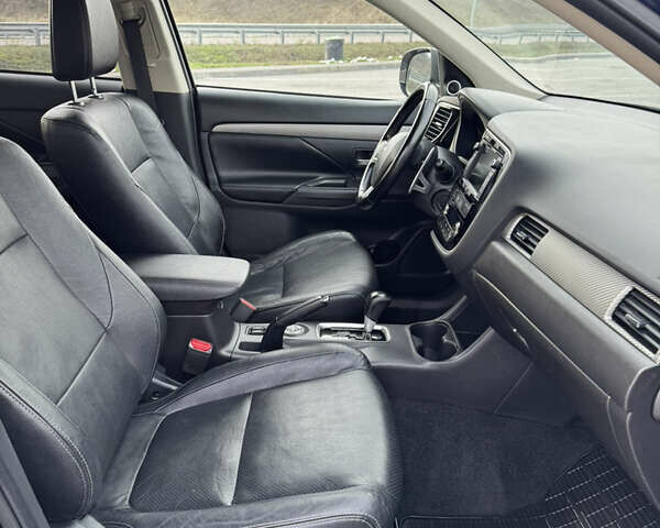 Синий Мицубиси Аутлендер, объемом двигателя 2 л и пробегом 218 тыс. км за 12550 $, фото 35 на Automoto.ua