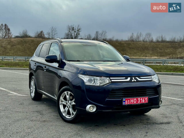 Синий Мицубиси Аутлендер, объемом двигателя 2 л и пробегом 218 тыс. км за 12550 $, фото 1 на Automoto.ua