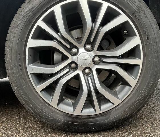 Синий Мицубиси Аутлендер, объемом двигателя 2.4 л и пробегом 202 тыс. км за 14300 $, фото 7 на Automoto.ua