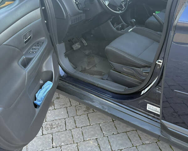 Синий Мицубиси Аутлендер, объемом двигателя 2.38 л и пробегом 99 тыс. км за 15400 $, фото 5 на Automoto.ua