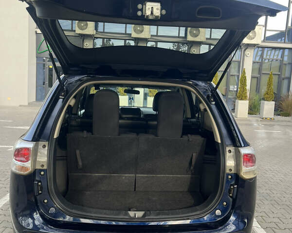 Синий Мицубиси Аутлендер, объемом двигателя 2.36 л и пробегом 187 тыс. км за 9999 $, фото 11 на Automoto.ua