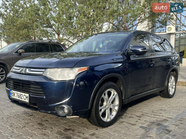 Синий Мицубиси Аутлендер, объемом двигателя 2.36 л и пробегом 187 тыс. км за 9999 $, фото 2 на Automoto.ua