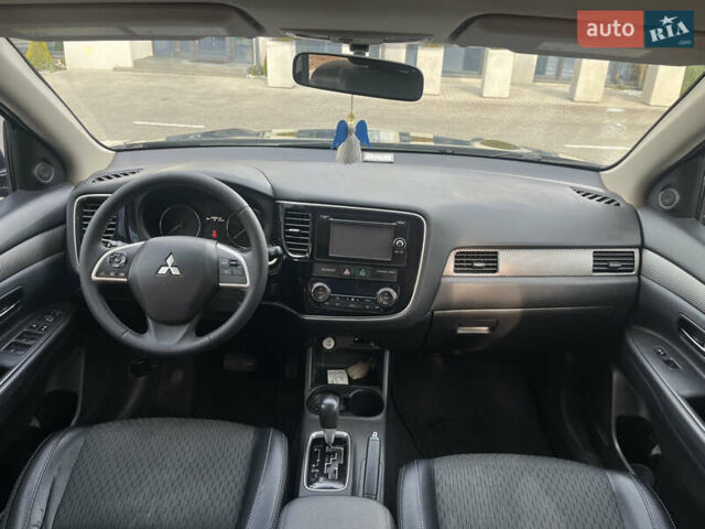 Синий Мицубиси Аутлендер, объемом двигателя 2.36 л и пробегом 187 тыс. км за 9999 $, фото 18 на Automoto.ua